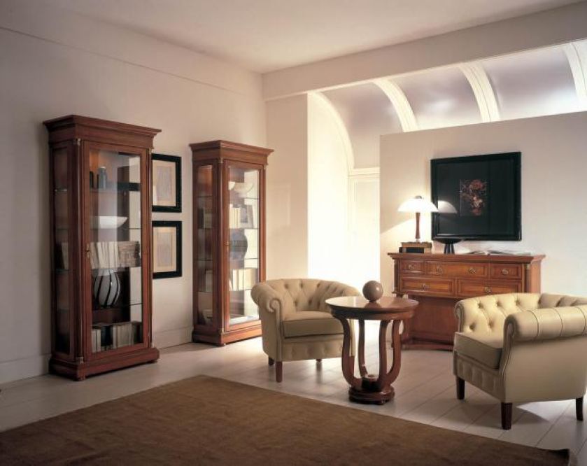 Zamiast biblioteki na całą ścianę, dwie zgrabne witryny. Aranżacja SELVA