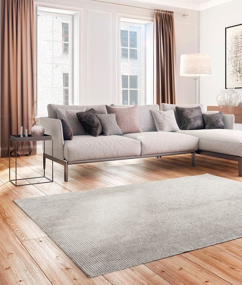 jak dobrać rozmiar dywanu w salonie